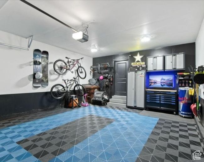 Garage featuring a garage door opener | Image 23