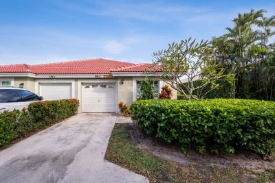 163 N Lakeshore Drive, Home with 3 bedrooms, 2 bathrooms and null parking in Hypoluxo FL | Image 2