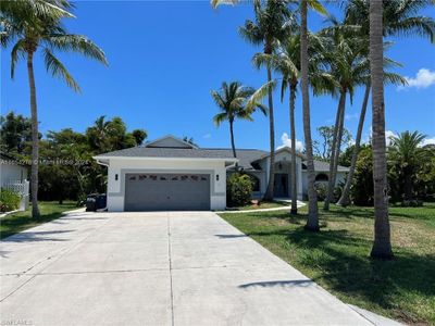 8896 Bracken Way, House other with 5 bedrooms, 3 bathrooms and null parking in Fort Myers FL | Image 1