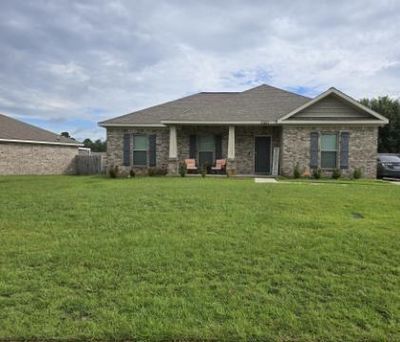 View of front of house featuring a front yard | Image 1