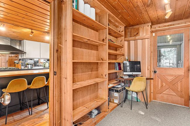 Bedroom with visible vents and wood finished floors | Image 20