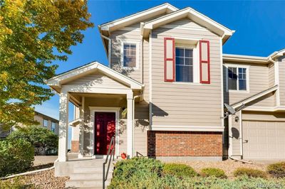 Welcome Home! Covered front patio - garage is a 1 car to the left of the door. There are 3 units in this building. | Image 1