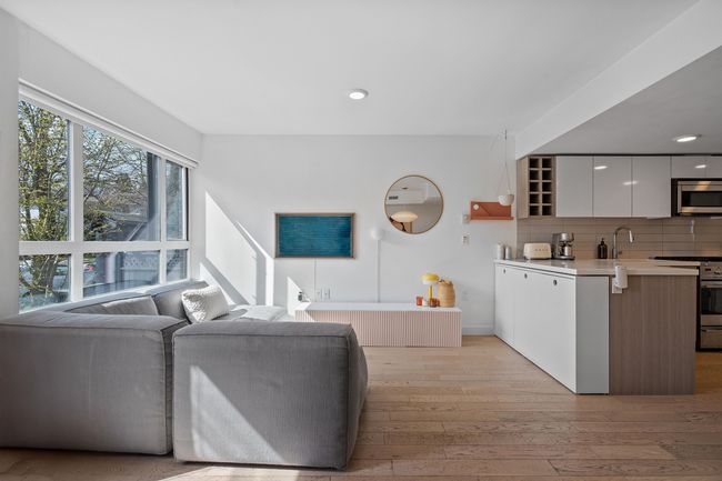 Living area with recessed lighting, light wood-type flooring, and baseboards | Image 9