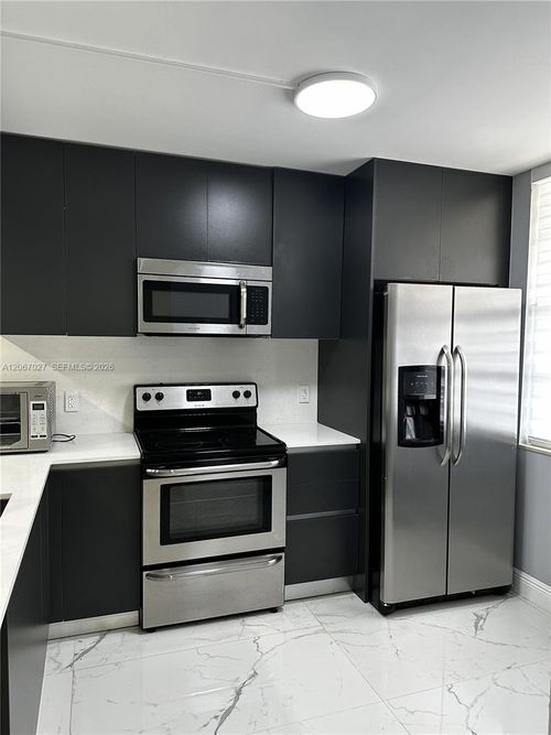 105-1719 Whitehall Dr, Davie, FL, 33324-6971 | Card Image