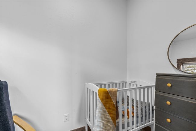 Bedroom featuring a nursery area | Image 24