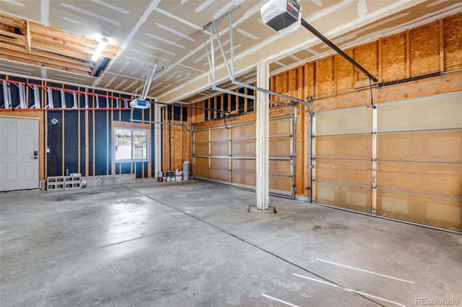 3-car garage with a garage door opener | Image 37