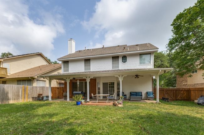 Back patio has plenty of room for a outdoor kitchen, dining and sitting areas. | Image 35