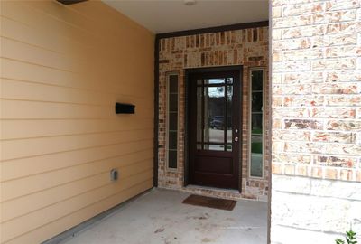 Elegant wood and glass main entry door. | Image 3