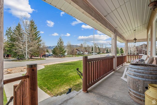 View of patio with a mountain view and covered porch | Image 6