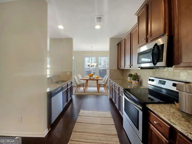 5791 Peltier Trce, House other with 3 bedrooms, 3 bathrooms and null parking in Norcross GA | Image 4
