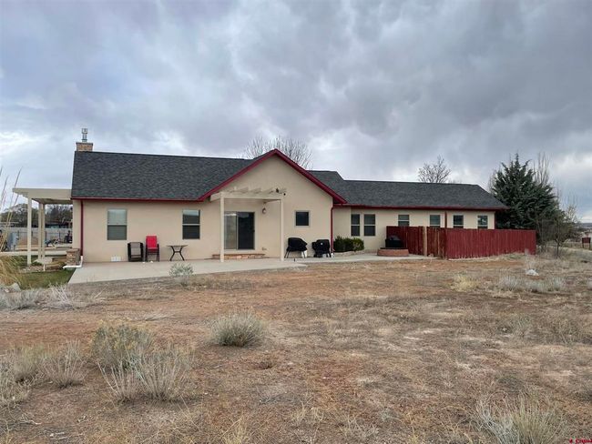 East facing side of the house with patio | Image 35