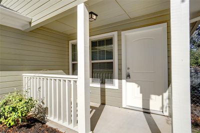 Property entrance featuring covered porch | Image 3