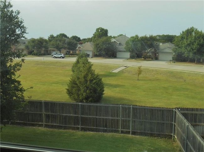 View of yard backing green belt | Image 22