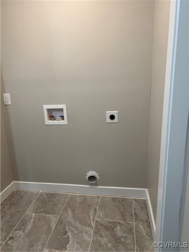 Laundry room featuring baseboards, hookup for an electric dryer, laundry area, and washer hookup | Image 28