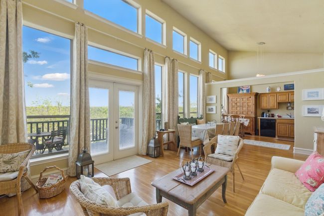 The adjoining kitchen makes entertaining a breeze. | Image 4