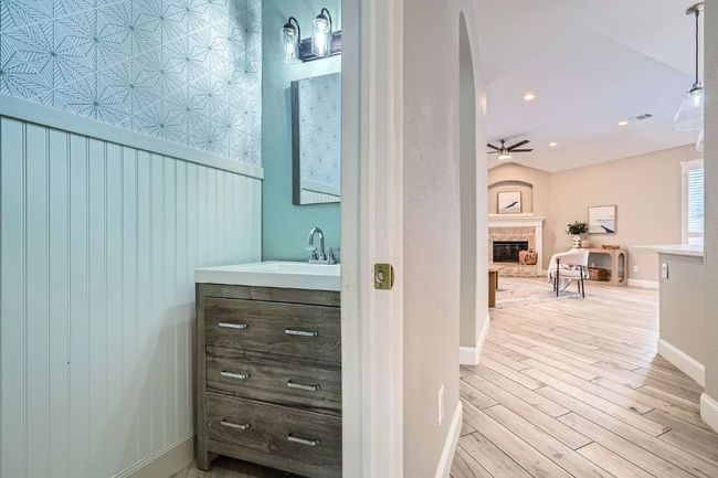 Cute powder bath for guests on the main floor | Image 22