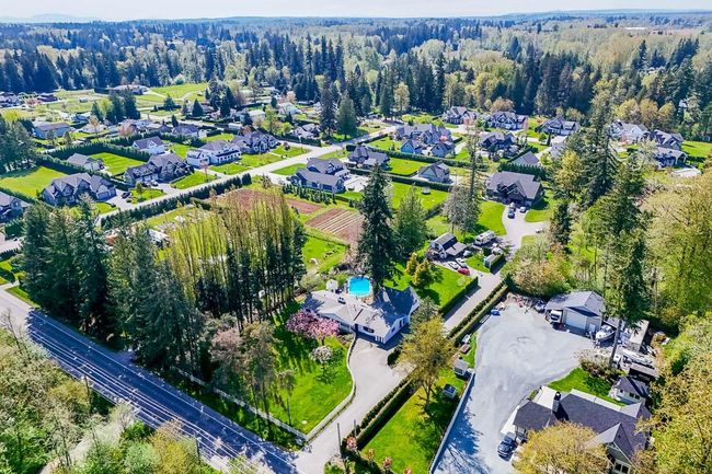 Aerial view featuring a residential view and a view of trees | Image 39