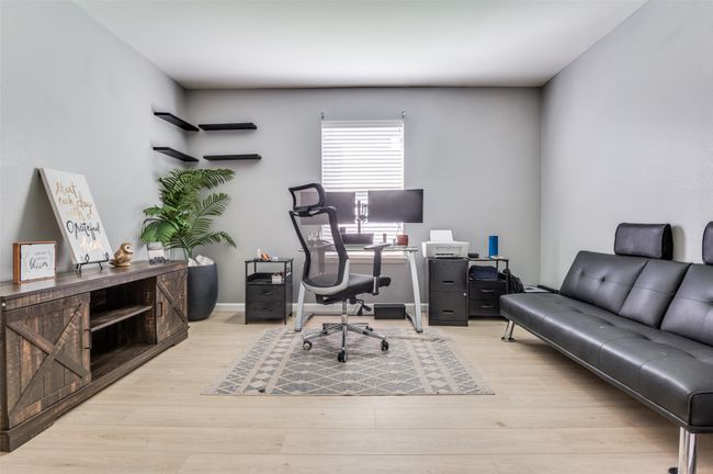 Office space with light wood-style floors. | Image 17