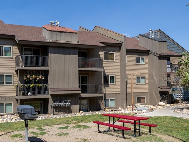 View of the back of the structure with an additional picnic area | Image 23