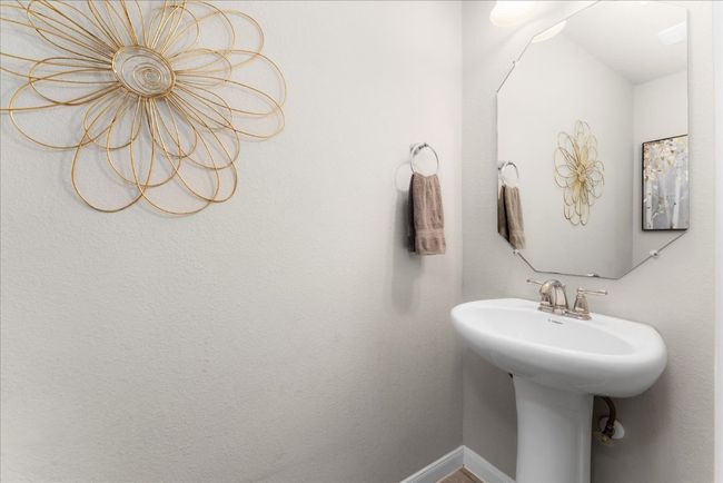 Bathroom with baseboards and a sink | Image 10
