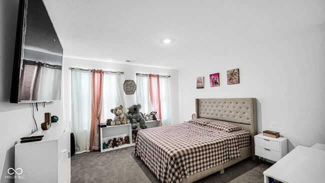 bedroom featuring carpet | Image 21