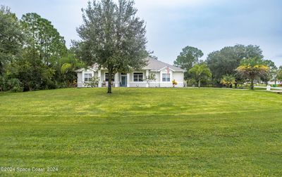 3550 Sparrow Hawk Trail, House other with 4 bedrooms, 2 bathrooms and null parking in Mims FL | Image 2