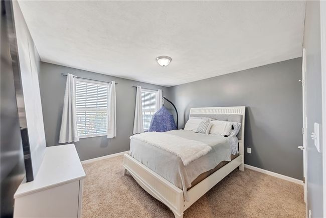 2nd bedroom is the largest and has a walk in closet. | Image 26