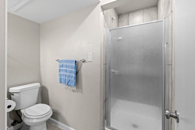 The second bath offers a walk-in shower. | Image 24
