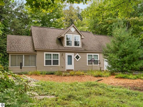 3941 Peninsular Shores Dr, Grawn, MI, 49637-9611 | Card Image
