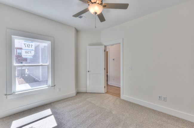 Secondary bedroom main level. | Image 21