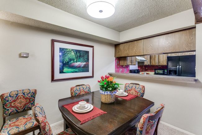 Dining room looking into kitchen | Image 4