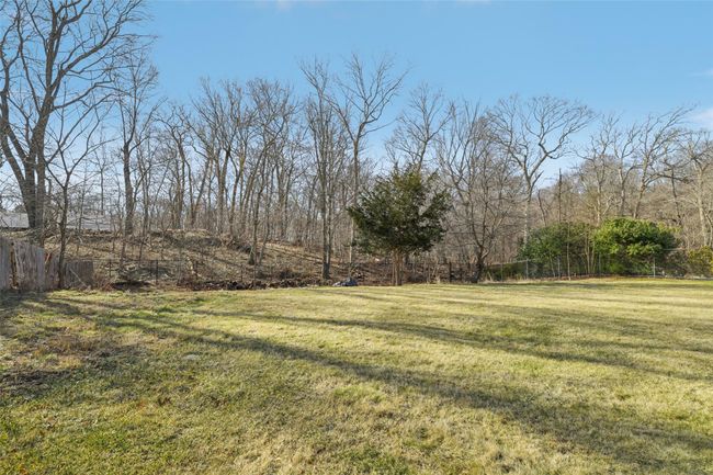 View of yard featuring fence | Image 32