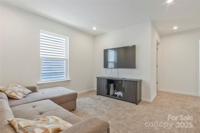 Loft area... great for movie night. could be used a second office space | Image 18
