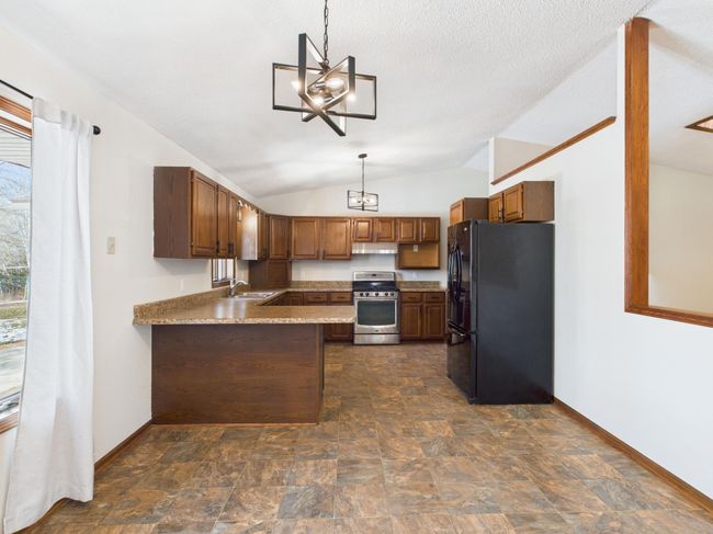 View from Dining Room into Kitchen | Image 10