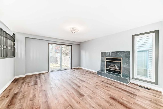 11 Cedargrove Way Sw, House other with 4 bedrooms, 3 bathrooms and 2 parking in Calgary AB | Image 4