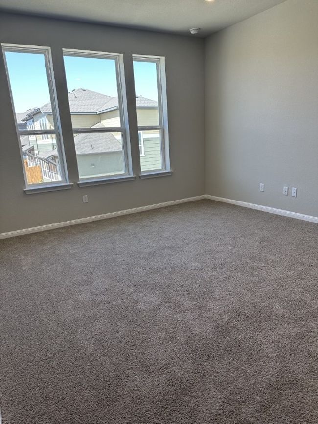 Carpeted spare room with baseboards | Image 9