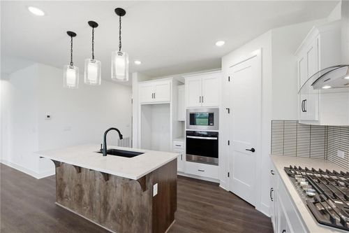 1820 Woodward Cir, Raymore, MO, 64083-8785 | Card Image