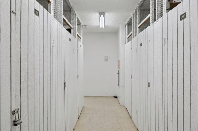 Storage locker and trash chute | Image 28