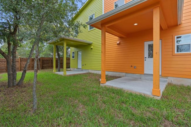 View of yard featuring fence and a patio | Image 28