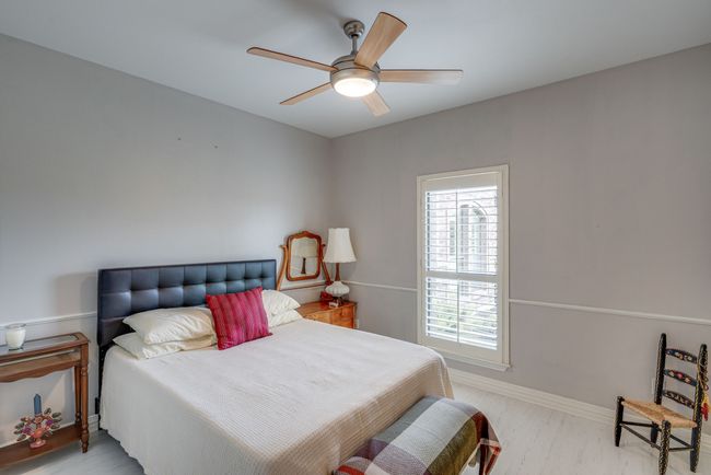 Bedroom, ceiling fan, walk-in closet with built-ins | Image 26