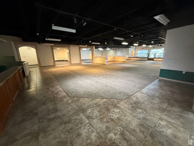 Interior space with baseboards | Image 11