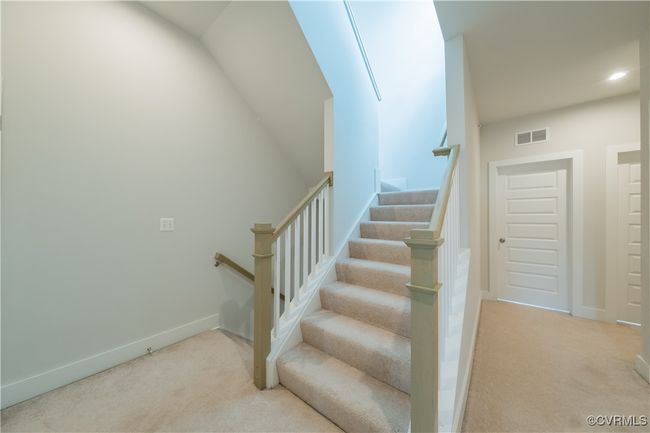 Staircase with carpet, baseboards, and recessed lighting | Image 41