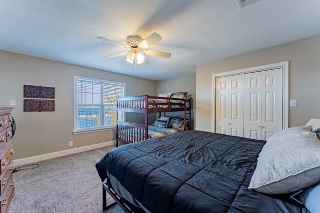 Guest bedroom 3 has beautiful views of the open water and private entrance to the screened balcony. | Image 23