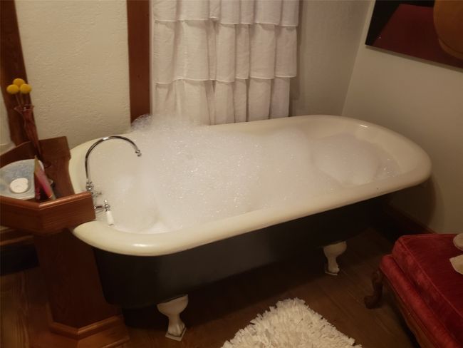 Original bear claw tub awaits in Keller's Studio Bath House | Image 21