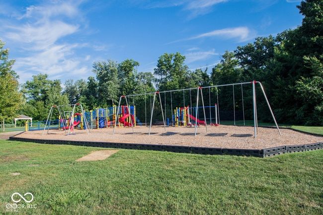 community play area featuring a lawn | Image 37