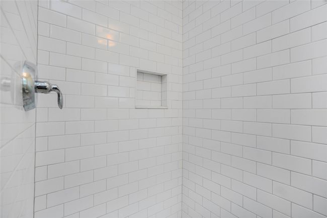 Bathroom with a tile shower | Image 23