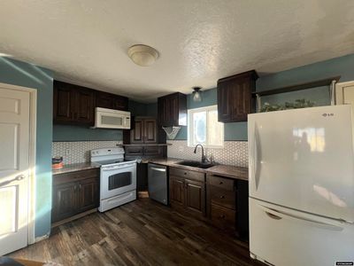 301 1st Street, House other with 3 bedrooms, 2 bathrooms and null parking in Urie WY | Image 3