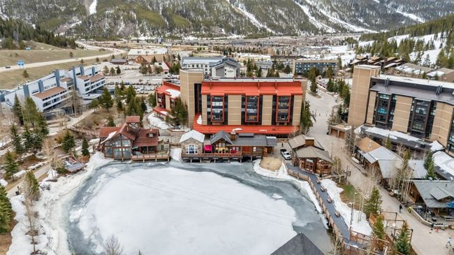 Snowy aerial view featuring a mountain view | Image 33