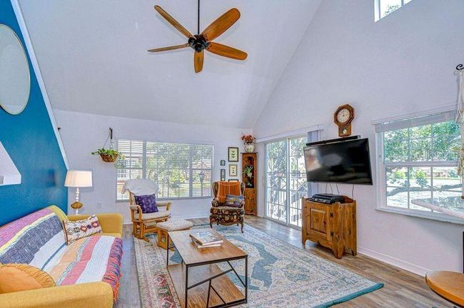 Living Room has beautiful views of Lake | Image 19