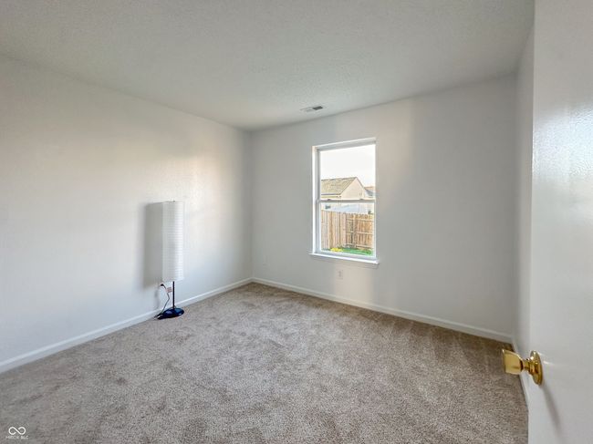 spare room with visible vents, baseboards, and carpet | Image 25